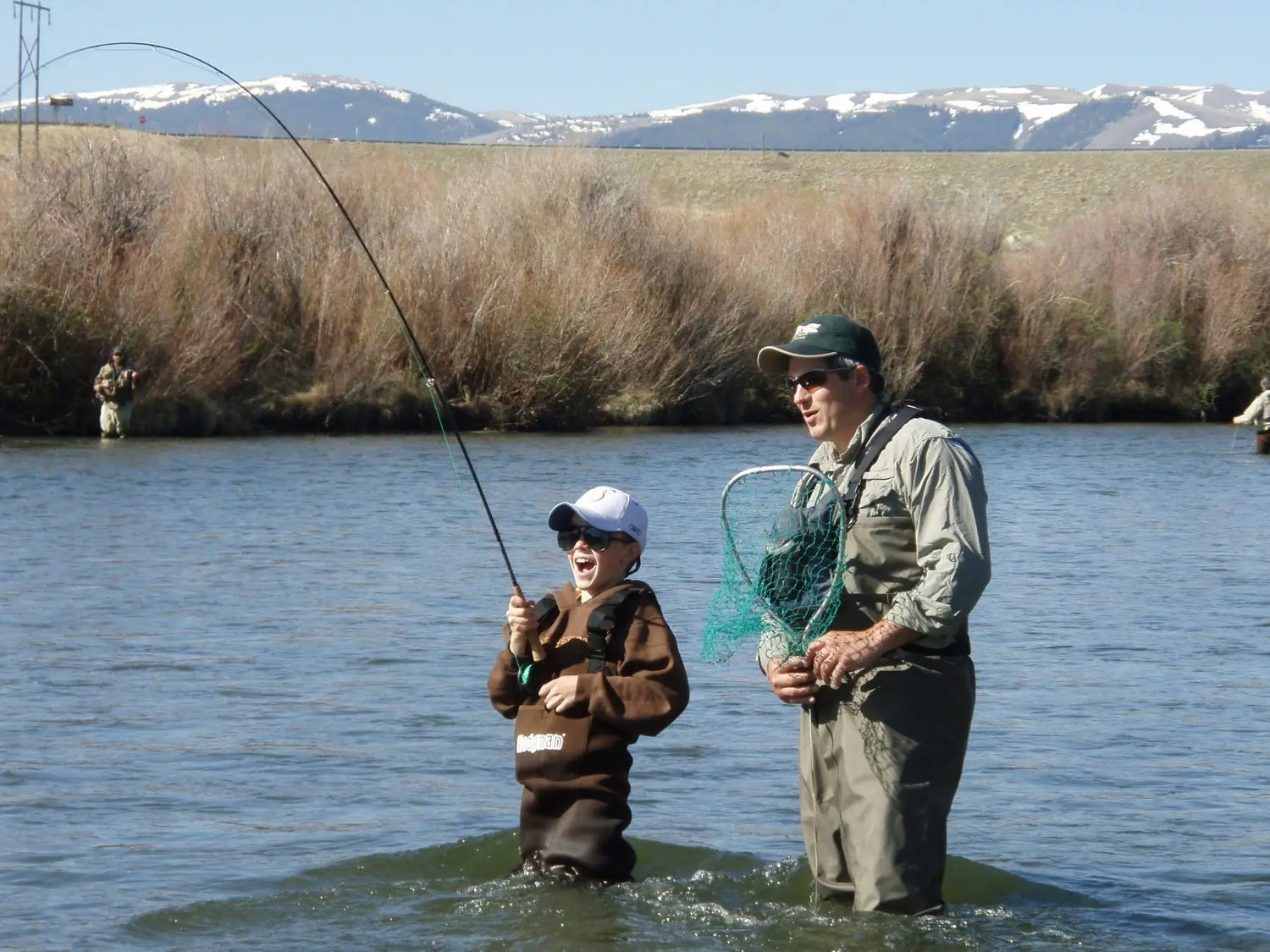 Father and Son Fly Fishing in Montana