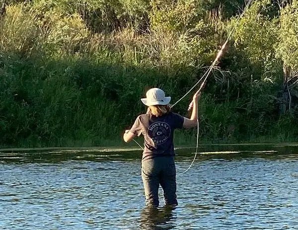 Woman Casting a Fly Rod