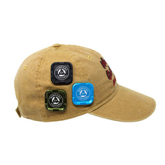 Three fly fishing hook keepers on a hat