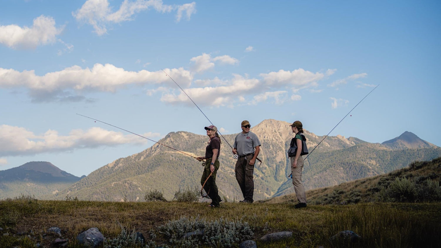 Three People Fly Fishing Together in Montana