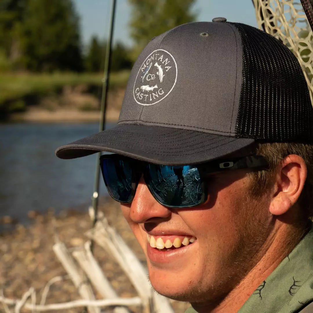 Fly Fisherman Wearing a Trucker Hat