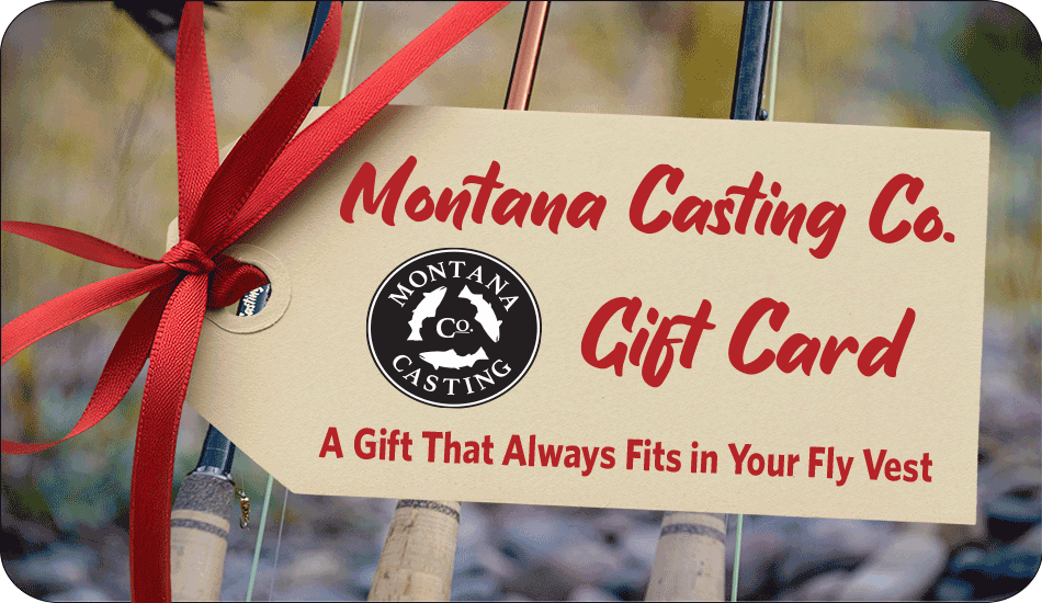 Montana Casting Co. gift card with red ribbon on a blurred outdoor background