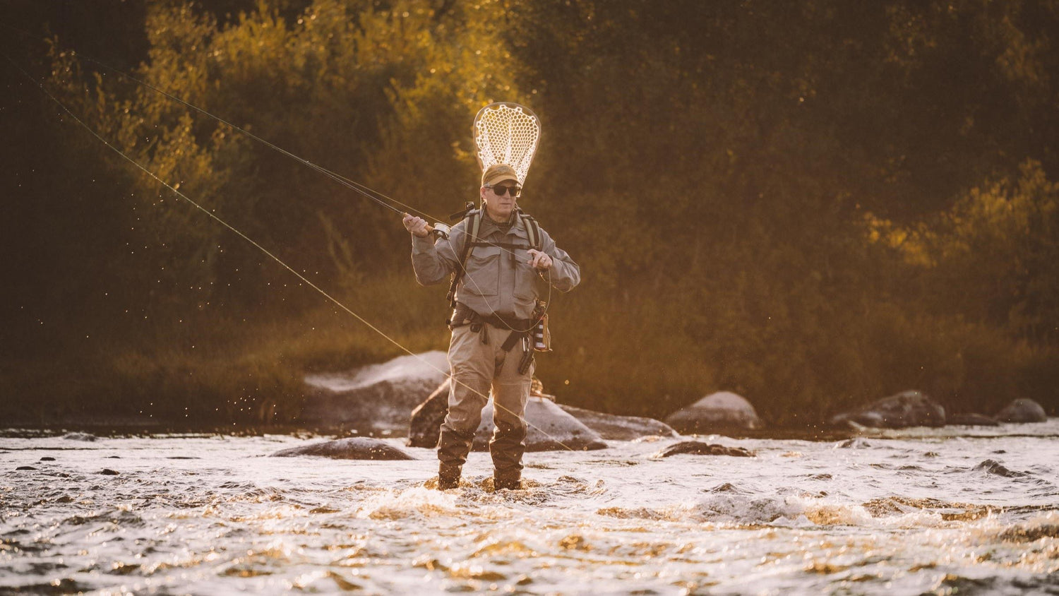 Fly Fisherman Casting Fly Rod